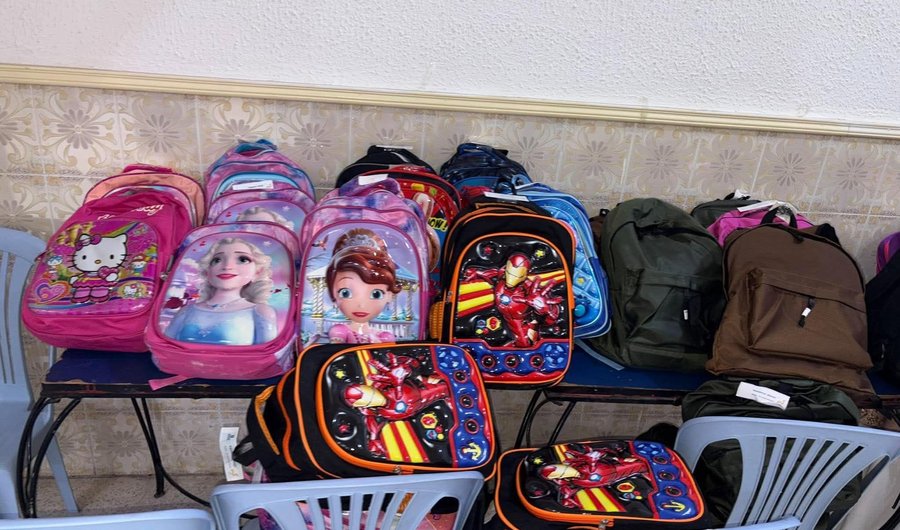 A schoolbag, a smile, a future