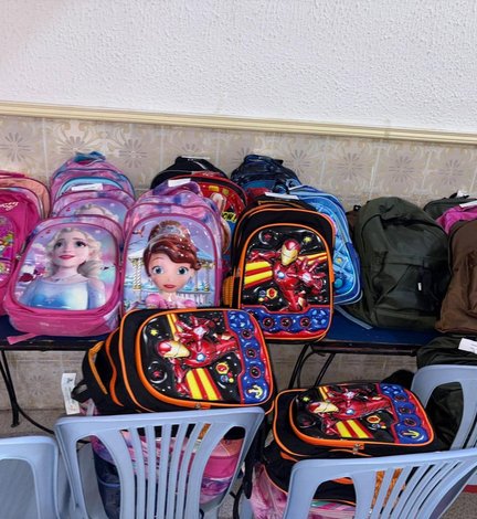 A schoolbag, a smile, a future